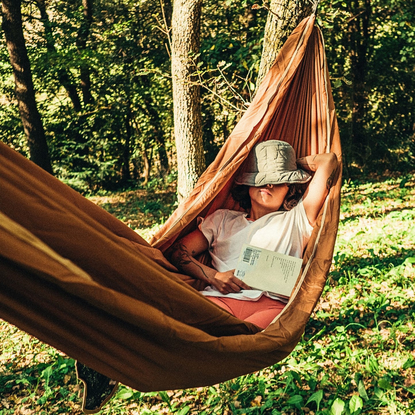 Relaxing in a hammock wearing Camper's Cologne