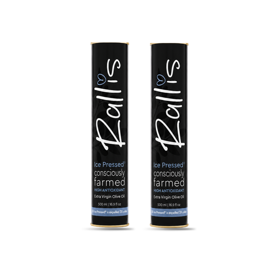 2 tins of Rallis Ice pressed olive oil on a white background. 