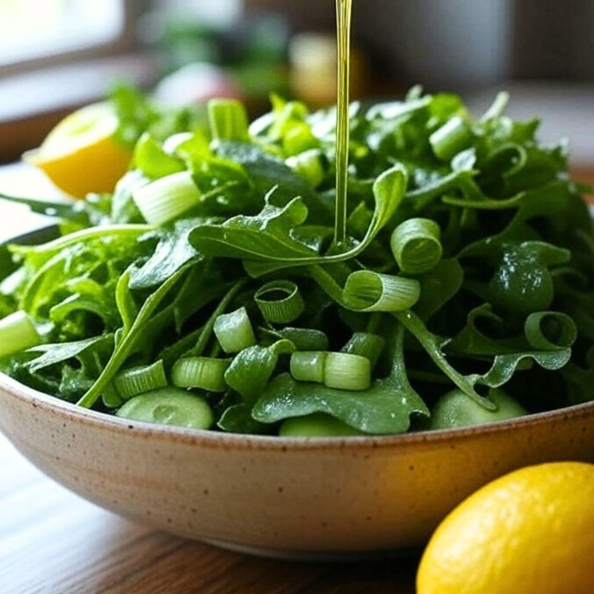 Bowl of Salad Greens drizzled with Rallis High Polyphenol Olive Oil