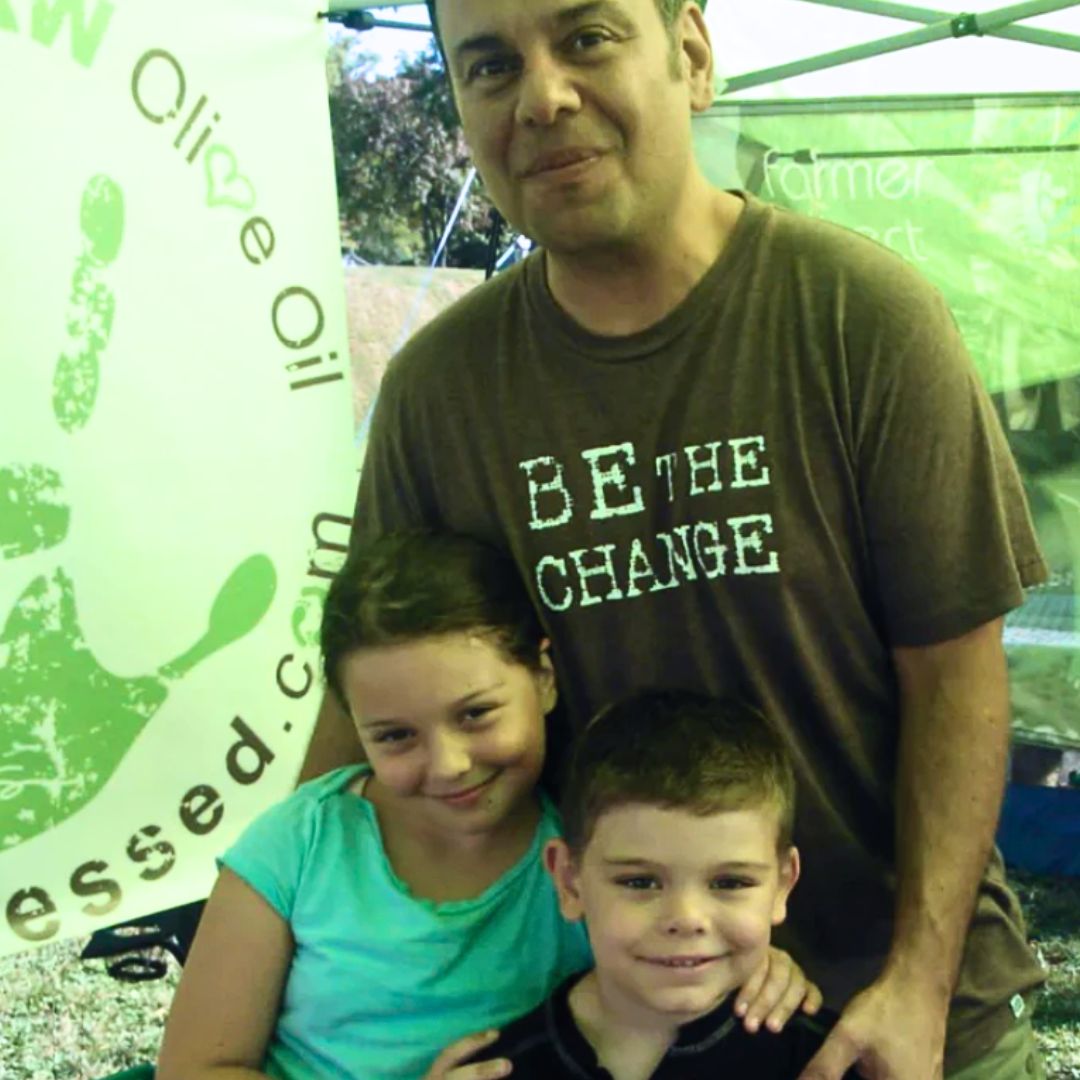 Theo, NIk and Grace Rallis at Art in the Park Rallis Olive Oil Booth